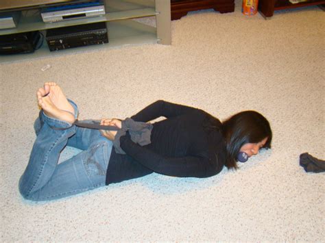 hogtied and barefoot